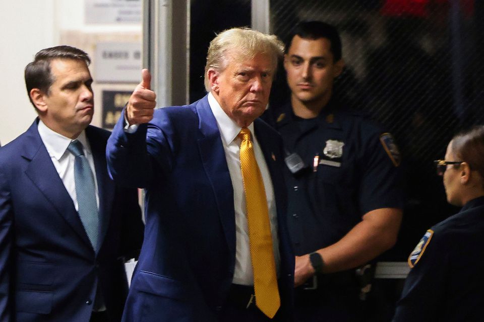 Former president Donald Trump returns to Manhattan criminal court after a break in his trial yesterday. Photo: AP