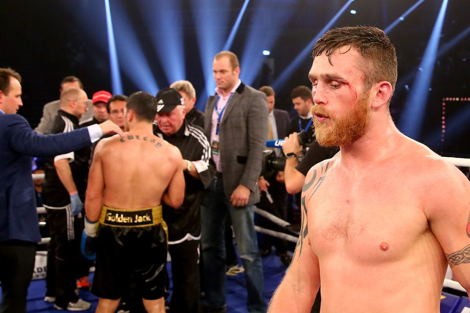 Dennis Hogan of Ireland looks dejected after the WBA World Championship Light Middleweight title fight at Inselparkhalle on December 5, 2015 in Hamburg, Germany.  (Photo by Martin Rose/Bongarts/Getty Images)