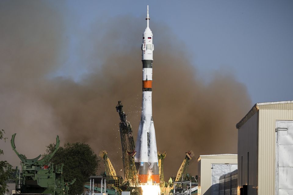 A Soyuz capsule is launched by a new Soyuz 2.1a rocket from the launch pad at Russia’s space facility in Baikonur, Kazakhstan (Roscosmos Space Agency Press Service photo via AP)