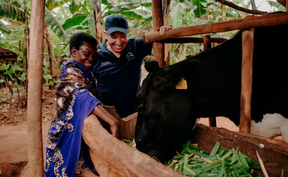 Lending his voice: Singer Tommy Fleming in Rwanda with a woman who was helped by Bóthar. Photo: Sean Curtin