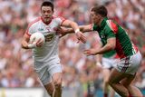 thumbnail: Tyrone's Conor Clarke in action against Seamus O'Shea
