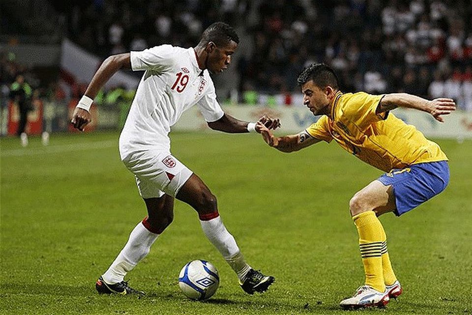 Wanted: Wilfried Zaha (left) is a key January target for Arsenal