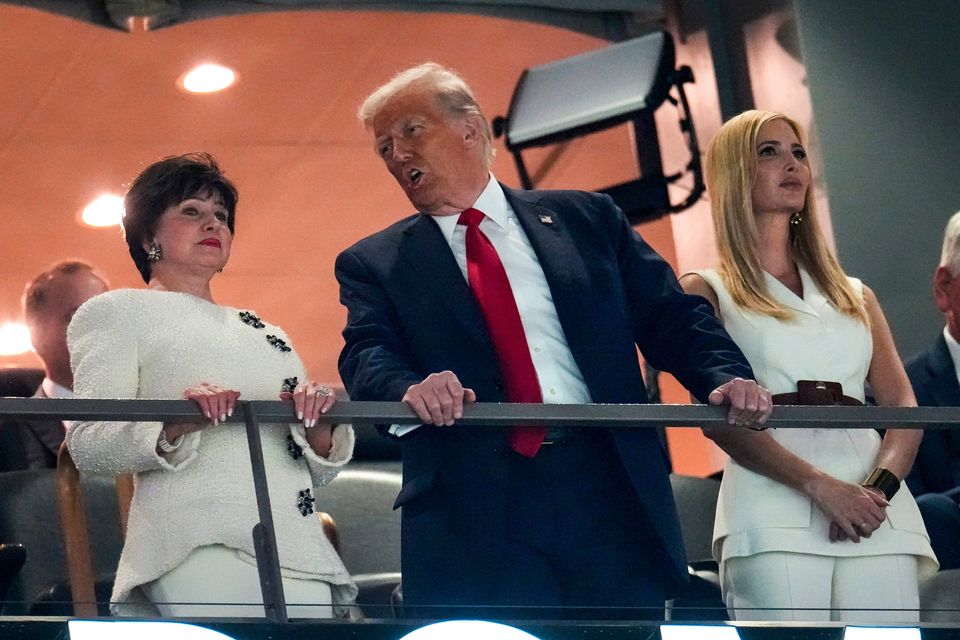 President Donald Trump, center, talks to New Orleans Saints owner Gayle Benson, left, while standing next to his daughter Ivanka Trump before the NFL Super Bowl 59 football game between the Kansas City Chiefs and the Philadelphia Eagles, Sunday, Feb. 9, 2025, in New Orleans. (AP Photo/George Walker IV)