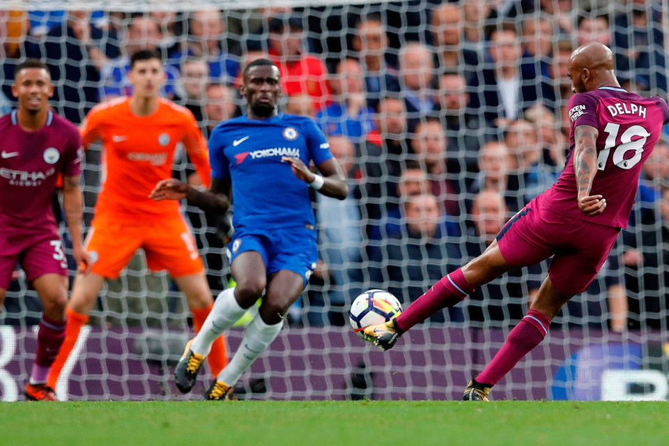Manchester City’s Fabian Delph fires a shot at the Chelsea goal during his side’s impressive 1-0 victory at Stamford Bridge. Photo: Reuters