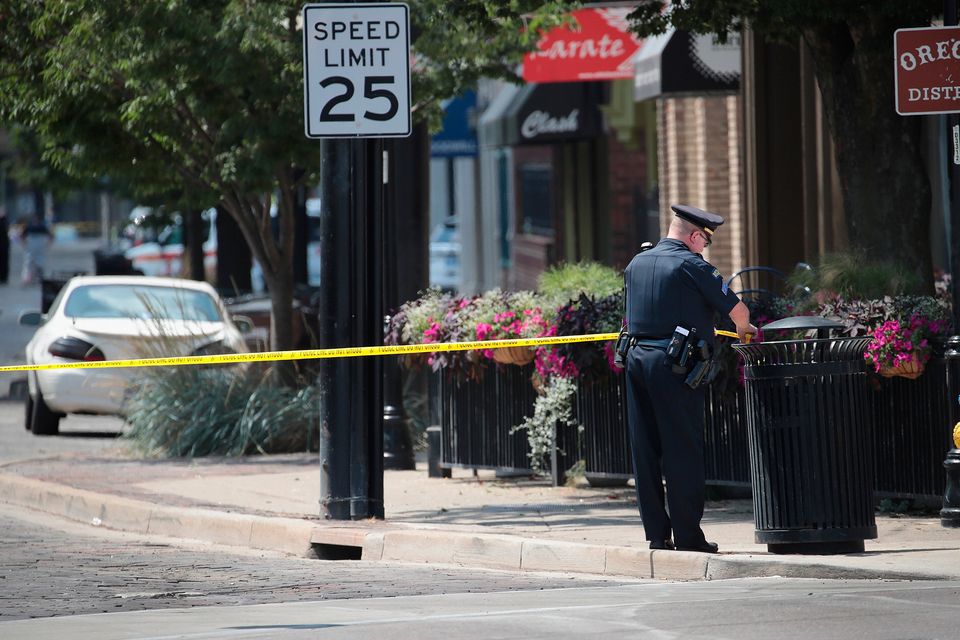 Police continue their investigation after a mass shooting in a popular nightlife district in Dayton, Ohio
(Photo by Scott Olson/Getty Images)