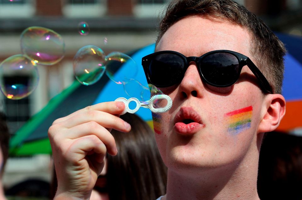 A man blows bubbles as supporters for same-sex marriage wait for the result of the referendum at Dublin Castle on May 23, 2015 in Dublin. Ireland looked set today to become the first country in the world to approve gay marriage by popular vote as crowds cheered in the streets of Dublin in anticipation of the spectacular setback for the once all-powerful Catholic Church.
AFP PHOTO /  Paul FaithPAUL FAITH/AFP/Getty Images