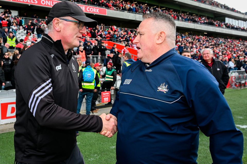 The Clare and Cork managers, Brian Lohan and Pat Ryan, shake hands after their Munster SHC clash at SuperValu Páirc Ui Chaoimh. Photo: Ray McManus/Sportsfile