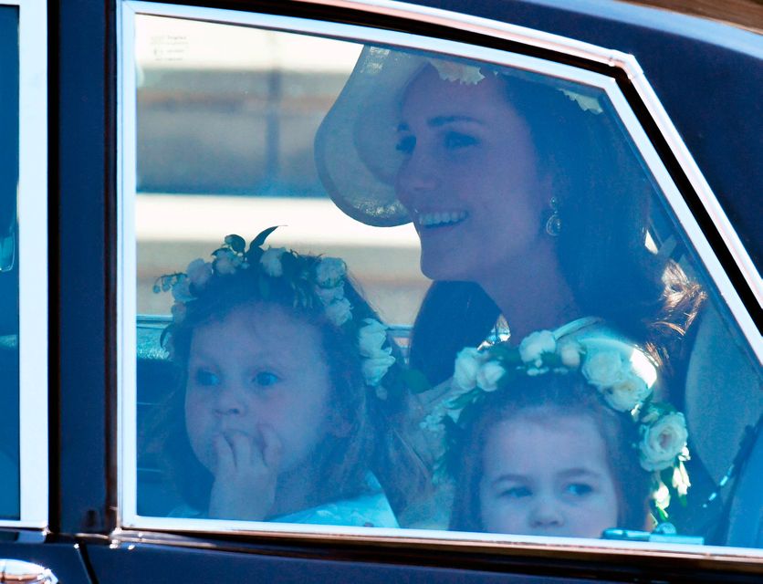 The Duchess of Cambridge arrives with the Princess Charlotte (right) at St George's Chapel at Windsor Castle for the wedding of Prince Harry and Meghan Markle. PRESS ASSOCIATION Photo. Picture date: Saturday May 19, 2018. See PA story ROYAL Wedding. Photo credit should read: Ben Birchall/PA Wire