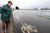 thumbnail: Billy Bradshaw looks at flooded cycle lanes in Clontarf, Dublin. Picture: Steve Humphreys