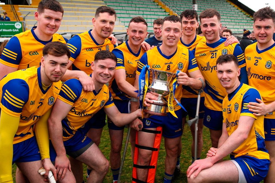 Eoin Fitzgerald of Roscommon, centre, celebrates with teammates