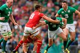 thumbnail: 29 August 2015; Jonathan Sexton, Ireland, is tackled by Rhys Webb, Wales. Rugby World Cup Warm-Up Match, Ireland v Wales, Aviva Stadium, Lansdowne Road, Dublin. Picture credit: Ramsey Cardy / SPORTSFILE
