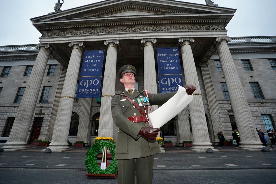 Commandant Daire Roache reads the Proclamation during a ceremony to mark the anniversary of the 1916 Easter Rising at the GPO on O'Connell Street Dublin, Sunday April 17, 2022. Photo: Niall Carson/PA Wire