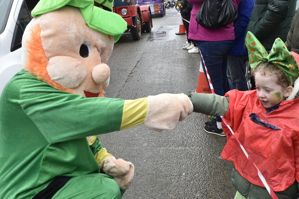 Tom Byrne and Lucy Maher during the St Patrick's Day parade in Carnew. Pic: Jim Campbell