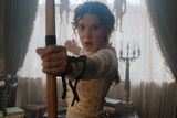 thumbnail: Taking aim: Millie Bobby Brown as Enola Holmes in the new Netflix film