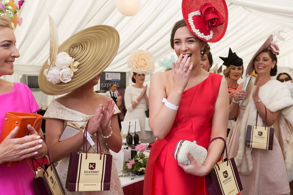 Alex Butler (in red) from Ballyedmond, Midleton, Co .Cork has scooped the coveted title of Kilkenny Best Dressed Lady at the 2015 Galway Races Ladies Day, this year sponsored by the Kilkenny Group