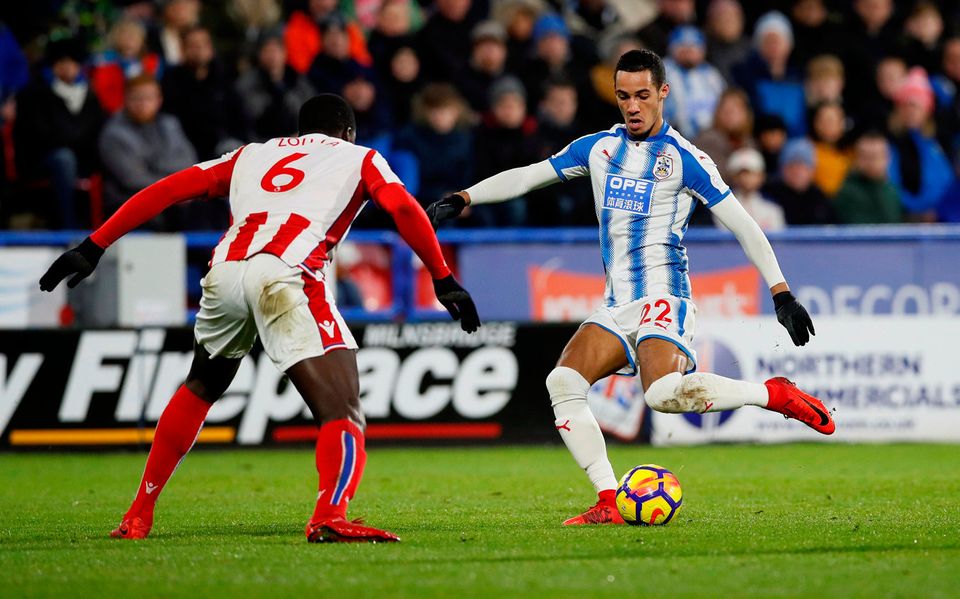 Huddersfield Town’s Tom Ince in action with Stoke City's Kurt Zouma. Photo: REUTERS/David Klein