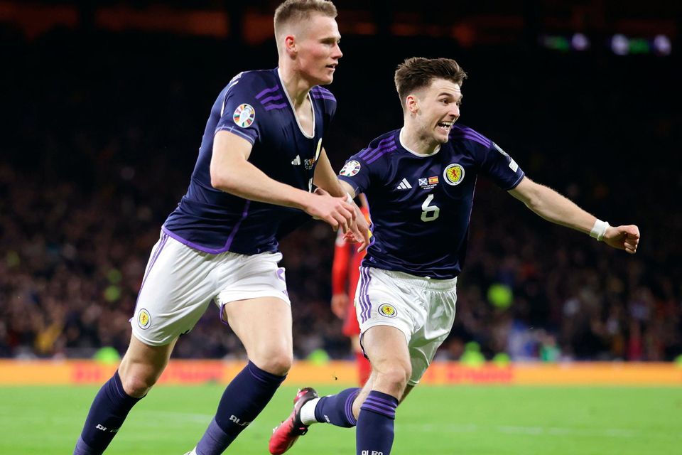 Scotland's Scott McTominay (left) celebrates scoring their side's second goal of the game with team-mate Kieran Tierney during the UEFA Euro 2024 qualifying group A match at Hampden Park