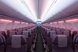thumbnail: The airline cabin of a Qantas 737-800