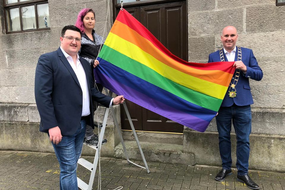 Mayor James Byrne and LGBTQ Manager, Peter James Nugent with the pride flag at the Civic Offices.