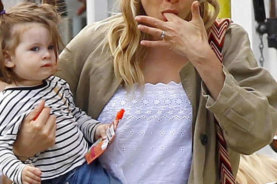 Sienna Miller out carrying her daughter Marlowe