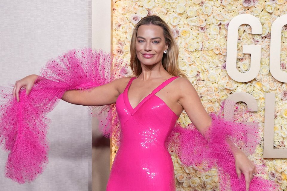 Margot Robbie arrives at the 81st Golden Globe Awards on Sunday, Jan. 7, 2024, at the Beverly Hilton in Beverly Hills, Calif. (Photo by Jordan Strauss/Invision/AP)