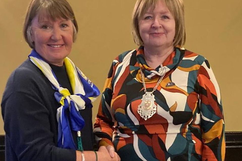 Sue Karran with new president Mary Louise Pearce.
