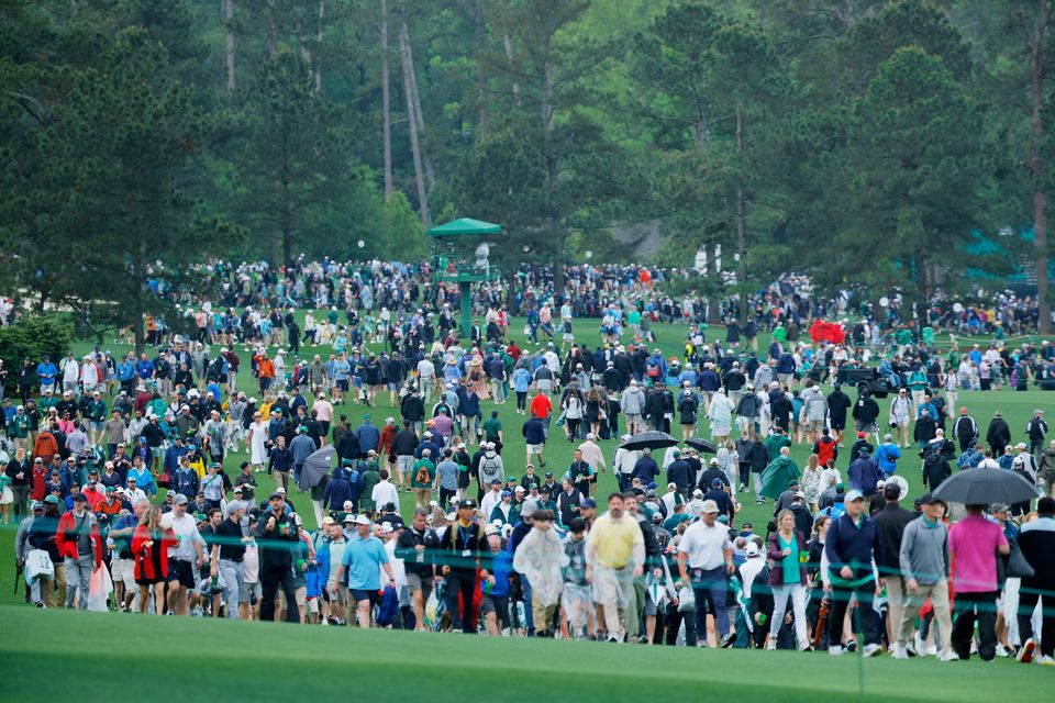 Golf - The Masters - Augusta National Golf Club, Augusta, Georgia, U.S. - April 7, 2025
General view as patrons leave the course after play is suspended after the weather horn is sounded during a practice round REUTERS/Brian Snyder