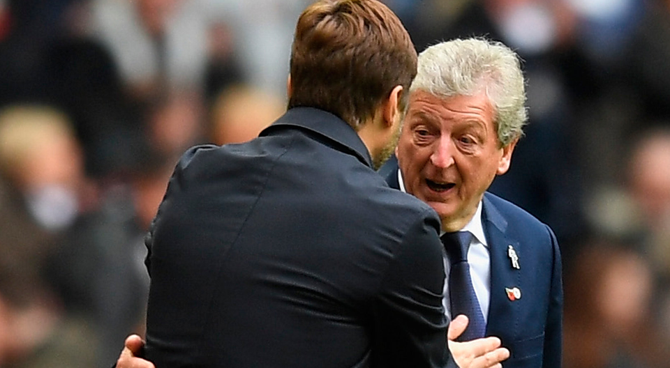 Mauricio Pochettino, Manager of Tottenham Hotspur and Roy Hodgson, Manager of Crystal Palace speak during the Premier League match. Photo: Getty Images