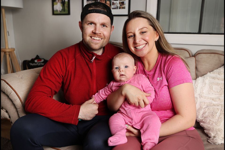 Darragh and Lauren Nelson with their youngest daughter Sophia. Photo: Steve Humphreys