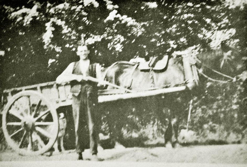 Harry Gleeson in front of a horse and cart