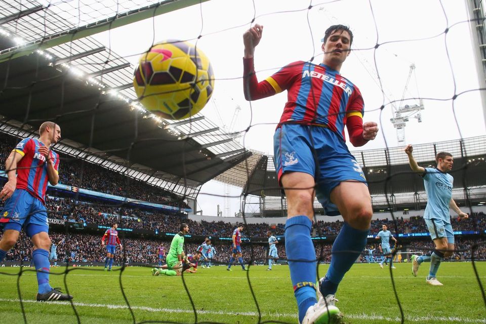 Crystal Palace defender Martin Kelly fails to stop David Silva's effort from crossing the line for Manchester City's opening goal in their Premier League clash at the Etihad. Photo: Alex Livesey/Getty Images