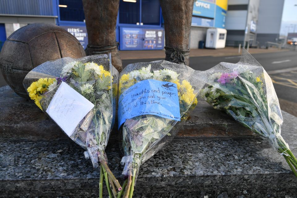 Flowers have been left near Cardiff’s stadium after after a plane with new signing Emiliano Sala on board went missing over the English Channel. (Ben Birchall/PA Images)