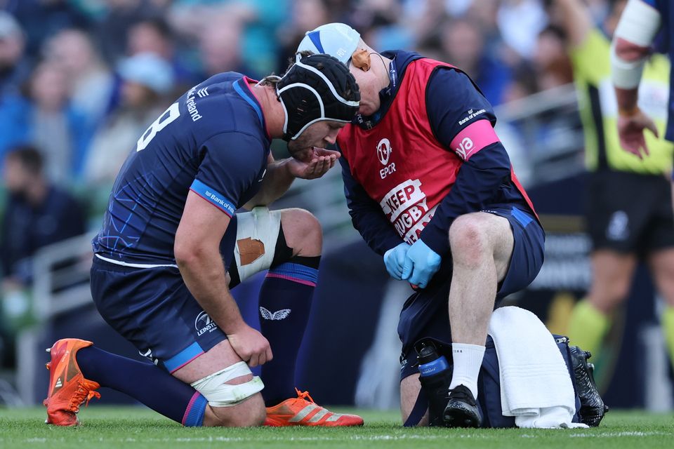 Caelan Doris is treated for an injury during Leinster's defeat to Northampton Saints