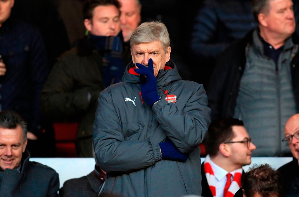 Arsenal manager Arsene Wenger pictured in the stands at the City Ground, Nottingham. Photo: PA