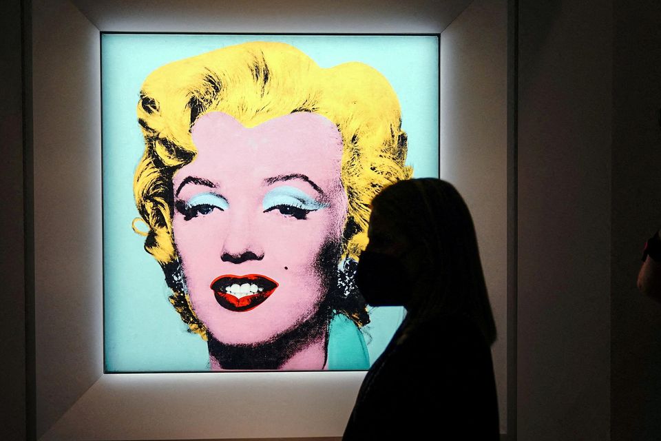 Andy Warhol's Shot Sage Blue Marilyn, a painting of Marilyn Monroe, is pictured on display at Christie's Auction House in advance of the piece going up for auction in New York. Picture: Reuters