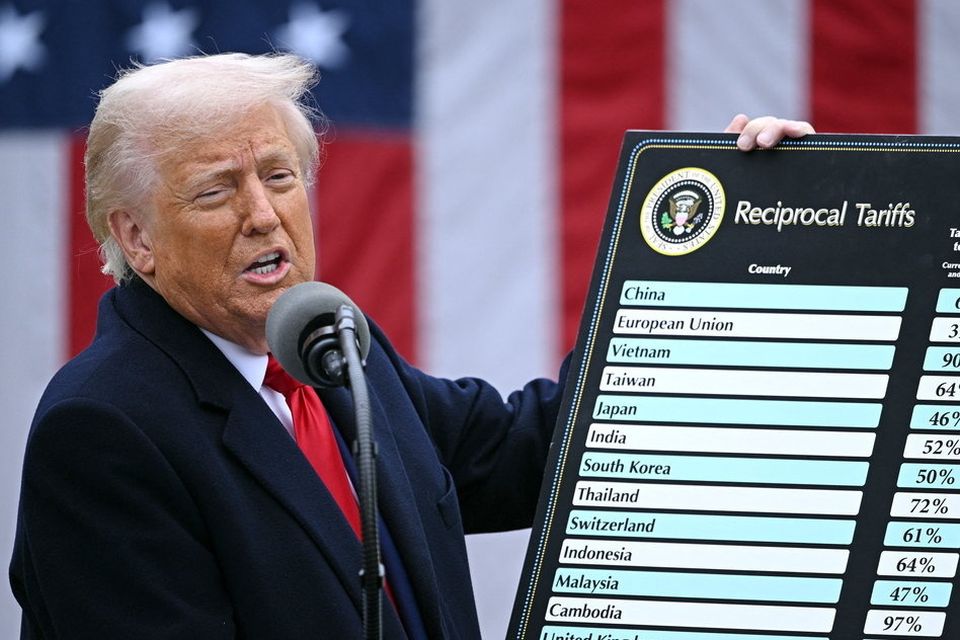 US president Donald Trump holds a chart as he delivers remarks on reciprocal tariffs at the White House on April 2. Photo: Getty