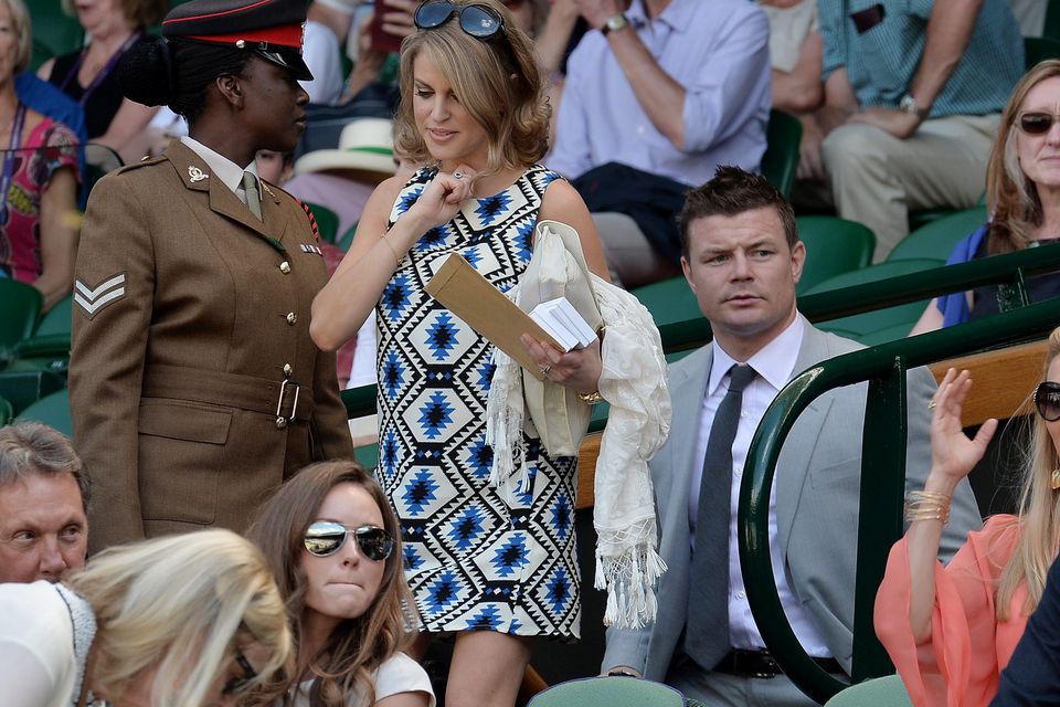 Brian O'Driscoll and his wife Amy Huberman arrive in the Royal Box during day twelve of the Wimbledon Championships