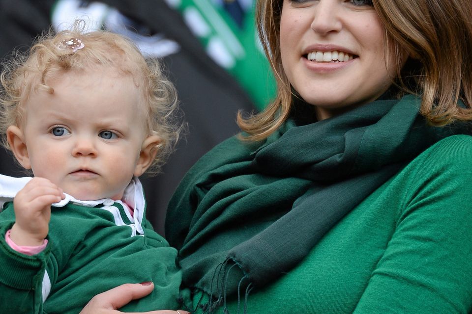 Amy Huberman, Brian O'Driscoll's wife, with their baby Sadie before the game. Photo: Paul Mohan / SPORTSFILE