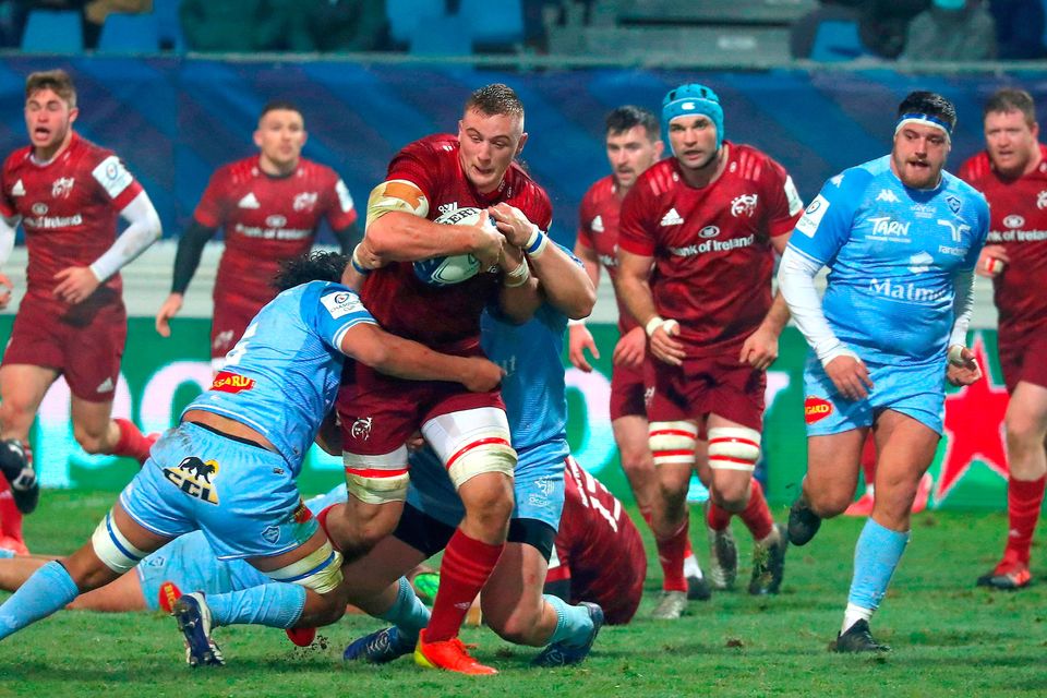 Munster's Gavin Coombes is tackled by Jack Whetton of Castres during the Heineken Champions Cup Pool B match at Stade Pierre Fabre in Castres, France. Photo: Manuel Blondeu/Sportsfile