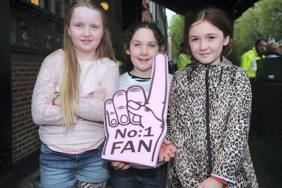 One Direction fans Chloe Duggan, age 8, Sarah O'Reilly, 8 and Ella O'Reilly, 9, from Athlone, on their way to see the band at Croke Park, Dublin.. Picture:Arthur Carron
