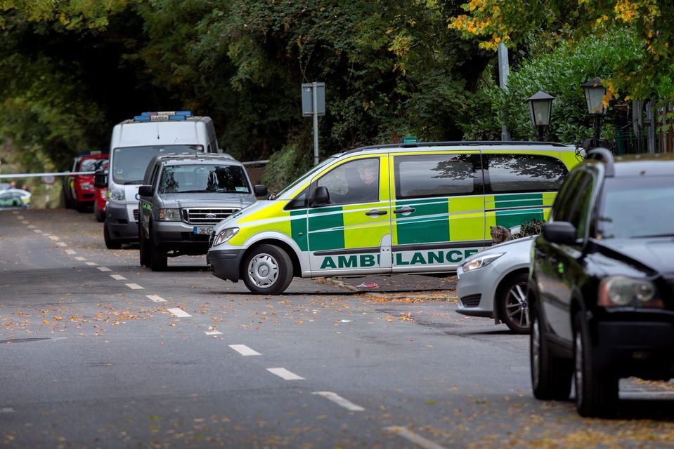 The ambulance hearse leaves the entrance of the halting site of the tragic fire at Glenmaluck Road, Carrickmines where it was bringing away the bodies of the deceased victims. Photo: Tony Gavin. 
Photo: Tony Gavin 10/10/2015