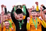 thumbnail: Captain Shay O’Leary collects the Dr. Tony O’Neill Cup to the delight of his team-mates.