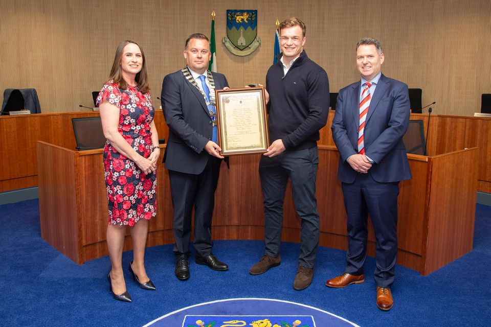 Cathaoirleach of the Wicklow Municipal District Paul O'Brien, CEO of Wicklow County Council Emer O' Gorman and Brian Gleeson present Josh Van Der Flier with the Cathaoirleach's Achievements and Contributions to Sport Award at a Civic Reception in Council Buildings, Wicklow town.
