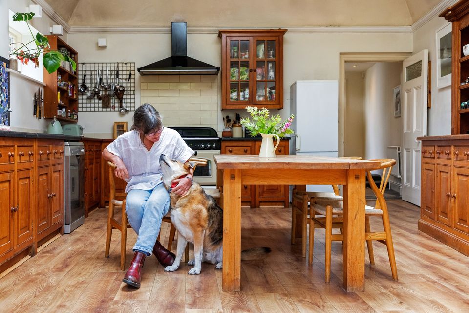 Artist Caroline Canning in the kitchen with Reno