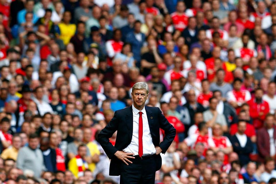 Arsenal's manager Arsene Wenger reacts during their English Premier League soccer match against Manchester City