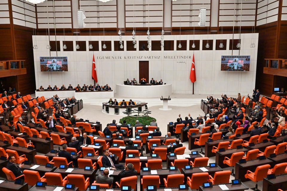 Turkish legislators vote in favour of Finland’s bid to join Nato at the parliament in Ankara (Burhan Ozbilici/AP)