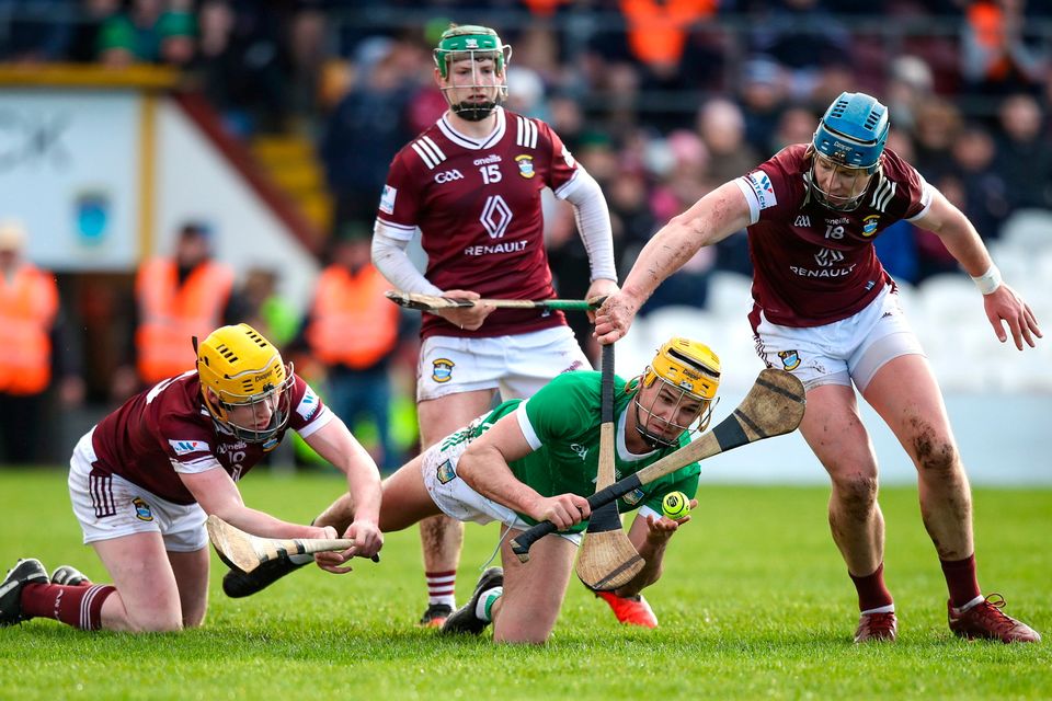 Limerick's Cathal O'Neill under pressure from Westmeath's Owen McCabe, David Williams, and Tommy Doyle during their Allianz HL Division 1 Group B duel at TEG Cusack Park,  Mullingar. Photo: Michael P Ryan/Sportsfile