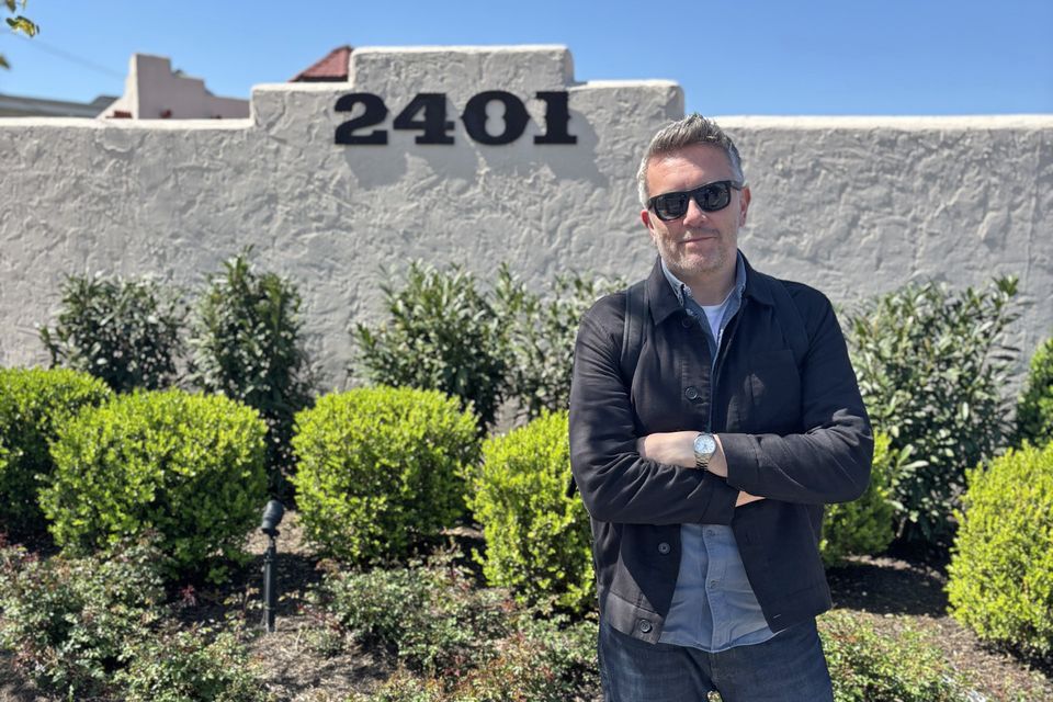 John outside Dolly Parton's studio compound in Nashville