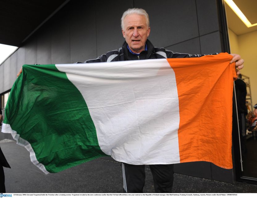 Giovanni Trapattoni holds the Tricolour after a training session