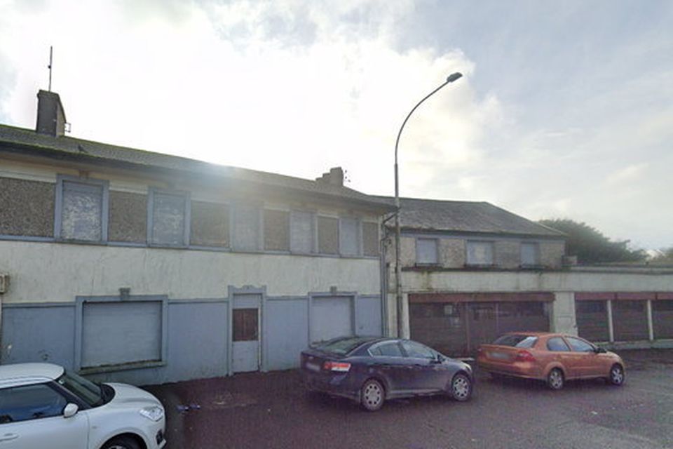 The former 'Mescall's Stores' and associated buildings on Meenane Main Street in Watergrasshill. Image: Google Maps
